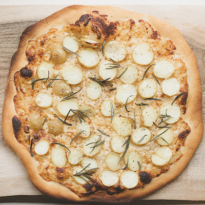 Potato pizza recipe (with creamy onions and gruyere cheese base)