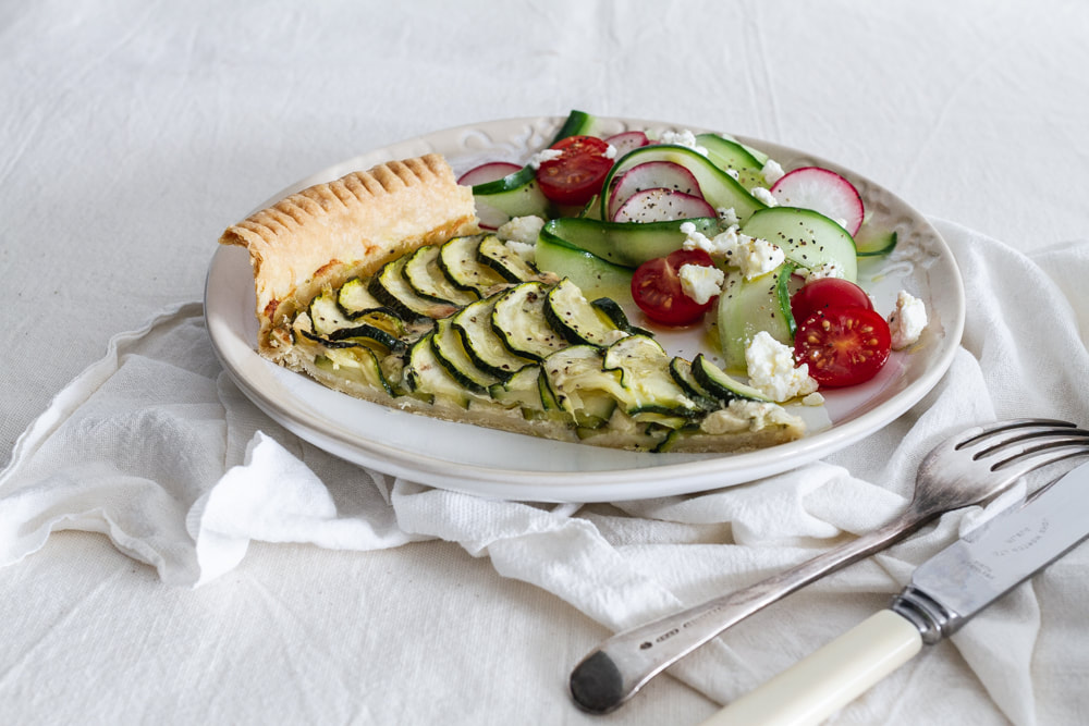 A delicious and seasonal summer recipe for courgette, mustard and gruyere cheese tart.