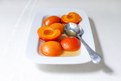 A delicious summer recipe for poached apricots with tonka bean.