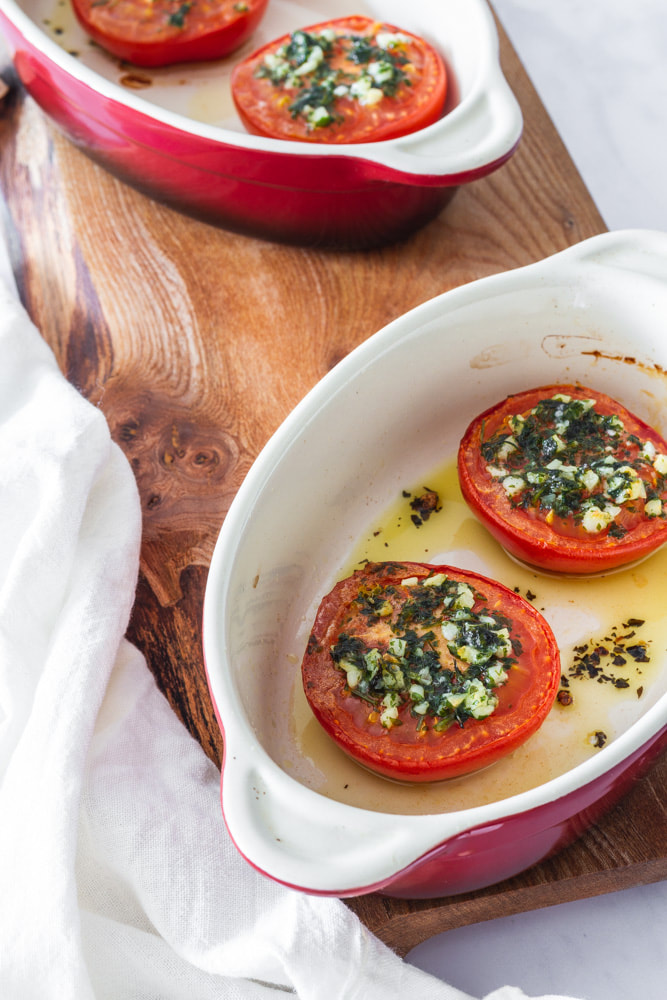 A delicious recipe for garlic and parsley roasted tomatoes as a summer side dish.